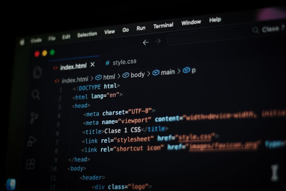 Close-up of a computer screen displaying lines of HTML code with syntax highlighting, including tags such as <h1>, <div>, and <img>. The code features elements related to web development, with referen